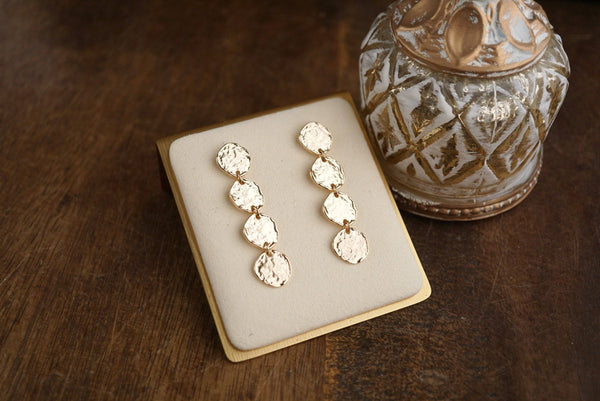 Golden Muse – Four Disc Cascade Earrings: Gold Tone