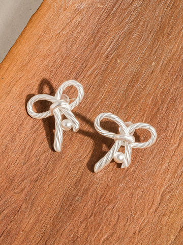 Dalton Textured Silver Bow Stud: Silver
