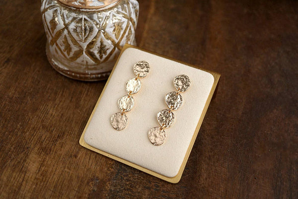 Golden Muse – Four Disc Cascade Earrings: Gold Tone