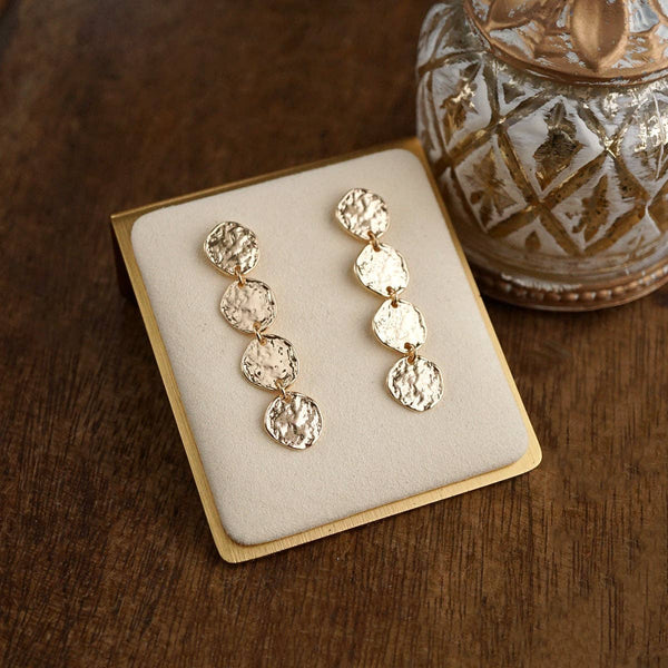 Golden Muse – Four Disc Cascade Earrings: Gold Tone
